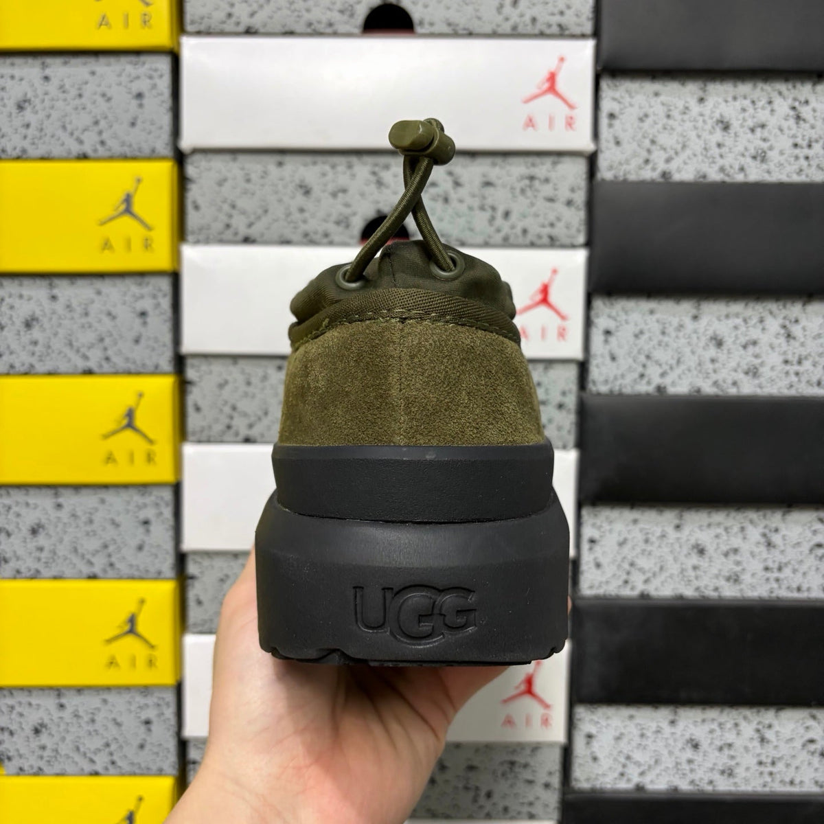 UGG Neumeel Deco Slip-On – Suede Moccasin Sneaker with Black Lug Sole & Tonal Drawstring in Olive