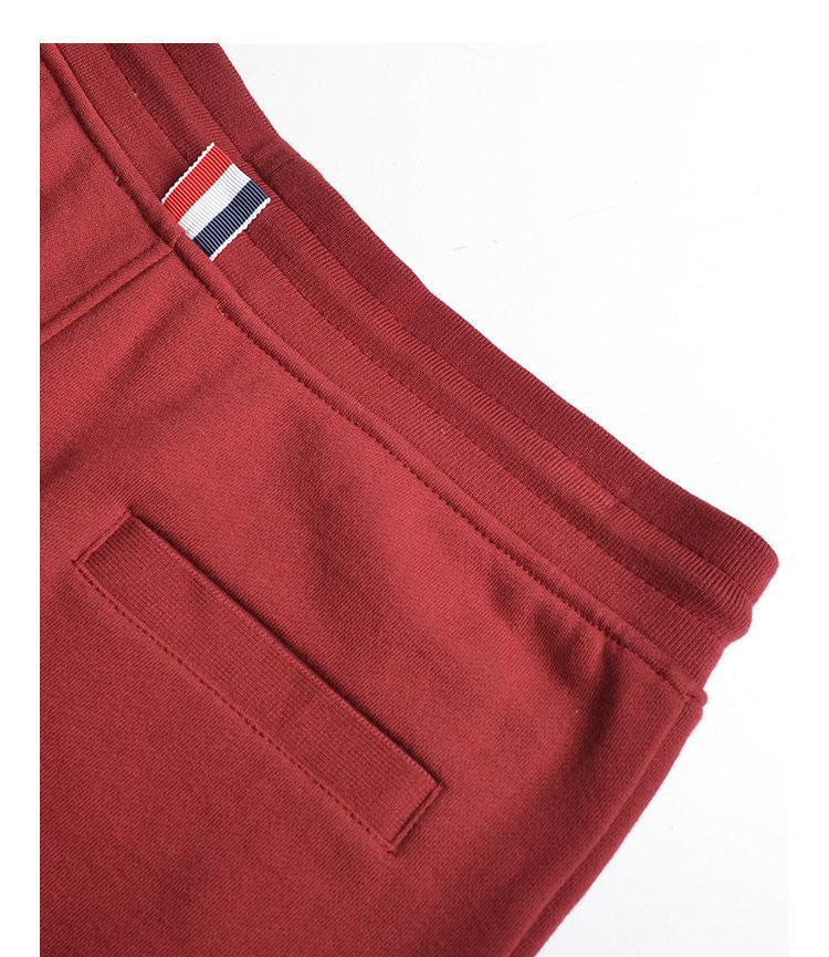 Thom Browne Style Unisex red sweatpants with Signature Four-Bar Detail