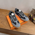 Hermès Contrast-Panel Low-Top Sneakers